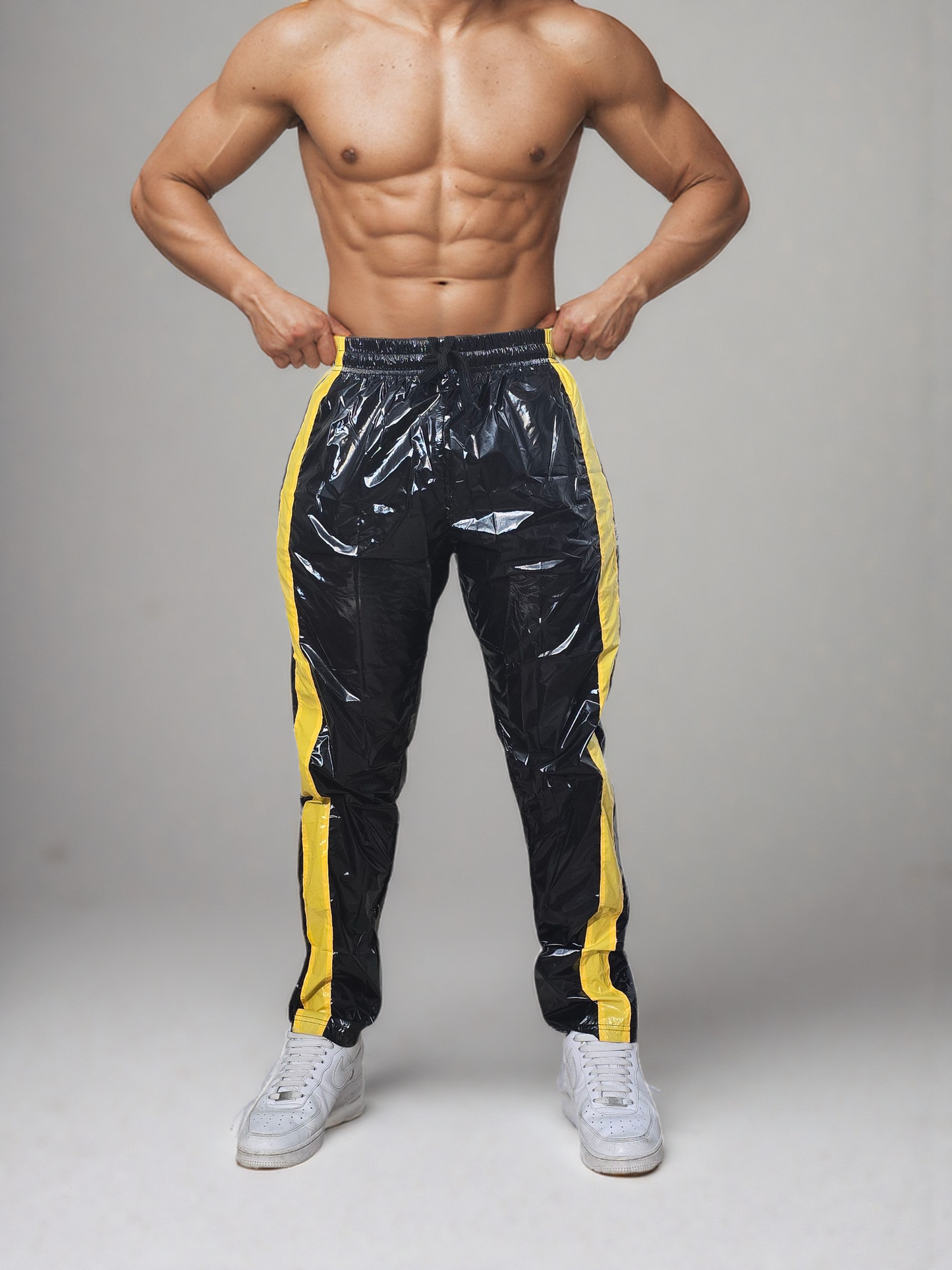 PU Nylon Sport Jogginghose aus PU Glanznylon gelbe Streifen